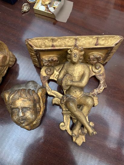 null Console in gilded wood XVIII° and head of cherub.
