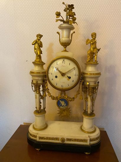 null White marble and gilt bronze clock with two uprights with lictor beams topped...