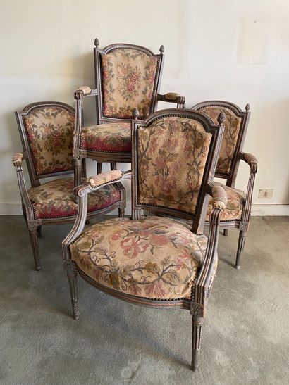 null Suite of four armchairs in natural wood with a cabriolet back. Louis XVI style....