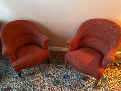 null Pair of red-trimmed armchairs.