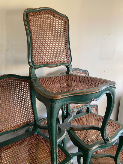 null Suite of six dark green lacquered chairs of cane. Louis XV style.