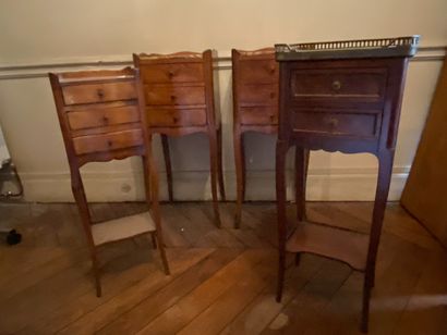 null Pair of bedside tables opening with three drawers and veined marble tops. Two...