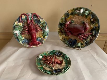 null Lot including three plates decorated with rustic polychrome figulines: crab,...