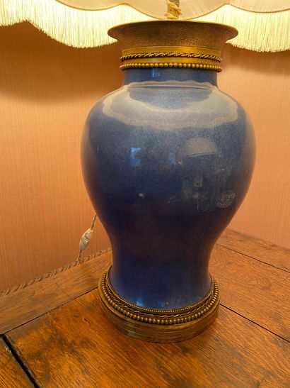 null Vase in powdered blue porcelain, gilt bronze mount. (Mounted with electrici...