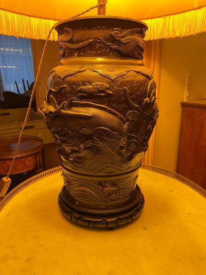 null Bronze vase with exotic decoration, mounted in lamp.