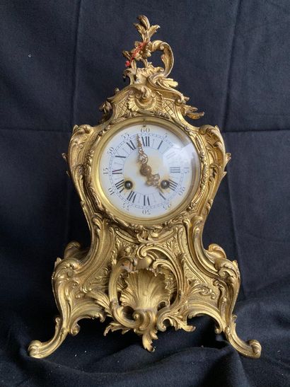 null Gilt bronze clock in the Louis XV style.