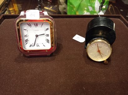 CARTIER/LOOPING Set of two metal desk clocks, one sheathed in leather, the other...