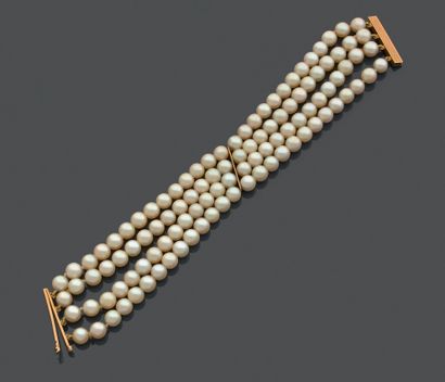 null * Bracelet four rows of twenty-seven cultured pearls each, the clasp in yellow...