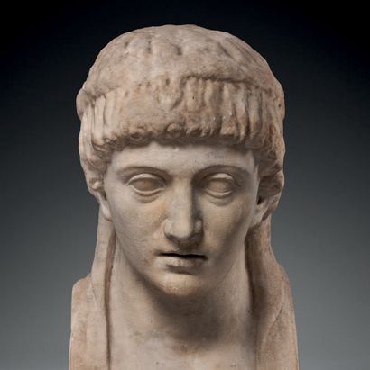 null Bust in Hermes larger than life representing a young man whose hair falls on...