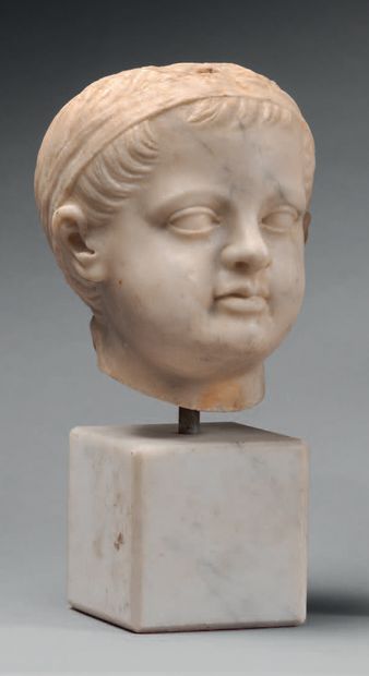 null Head representing the portrait of a young boy whose hair, composed of short...