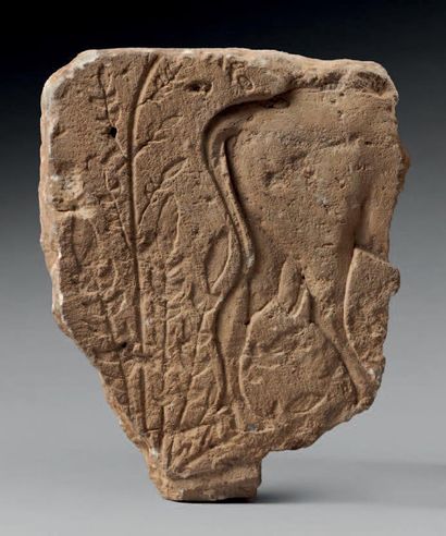 null Fragmentary relief engraved with a bovid hindquarters and plants.
Limestone.
Egyptian...