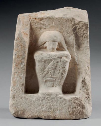 null Fragment of sculpture representing in high relief a cube statue inscribed with...