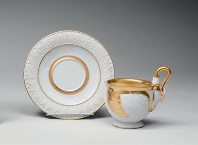 BAVIÈRE. Porcelain cup and saucer, the cup in the shape of a swan, the feathers and...