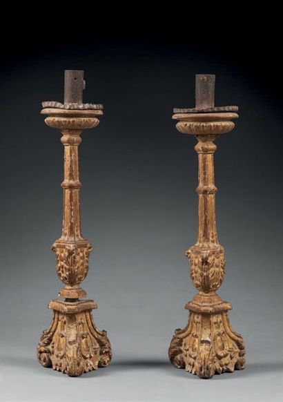 null Pair of carved and gilded wood and iron pikes; (missing and worn).
Louis XIV...