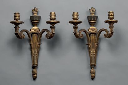 null Pair of gilt bronze light arms with two branches, decorated with Ionic capitals,...