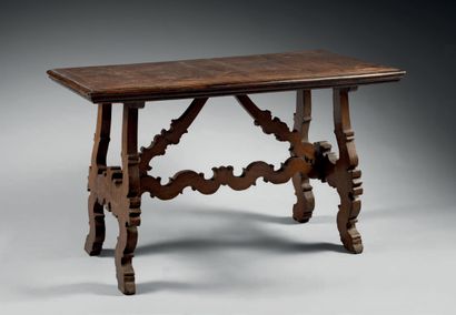 null Table in marquetry of rectangular form with stylized scrolls in rectangular...