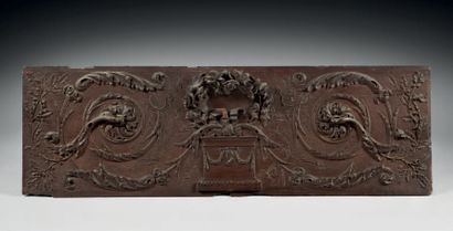 null Oak panel carved in the arabesque taste of scrolls, crown of flowers and ribbon...