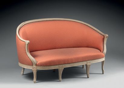 A molded and painted wood basket-shaped sofa,...