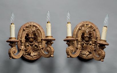 Pair of gilded wood sconces with two oval...