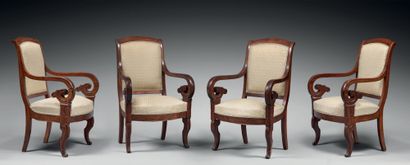 Suite of four mahogany armchairs with reversed...