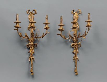 Pair of ormolu sconces with two lights and...