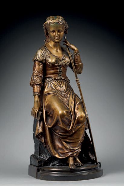 null Figure en bronze à deux patines représentant une
Femme à la rame ; signé DORIOT.
H...