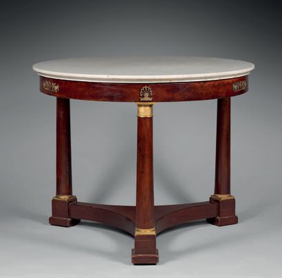 Circular mahogany table, the white marble...