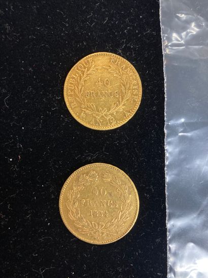 null Deux pièces d'or de quarante francs (An XII et 1834).

(usures). 

Poids: 25.76...
