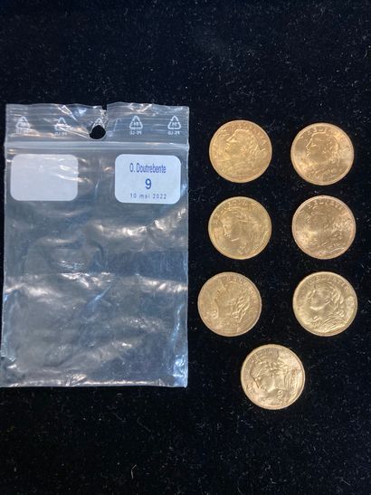 null Sept pièces d'or de vingt francs suisse (deux sont de frappes étrangères).

(usures)

Poids:...