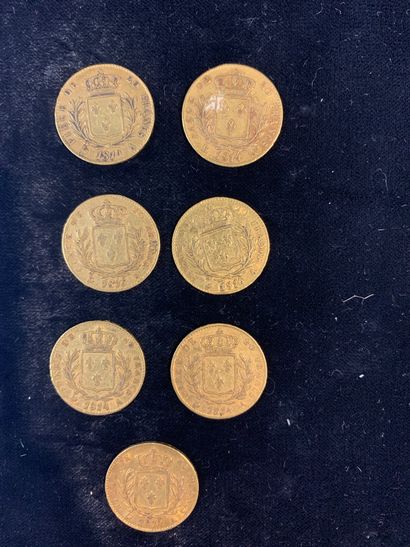 null Sept pièces d'or de vingt francs Louis XVIII.

(usures). 

Poids : 44,92 gr...