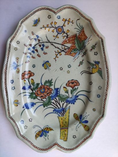 Rouen Oval earthenware dish with contoured rim, polychrome decoration of flowering...