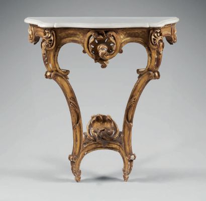 null Molded, carved and gilded wood console table, with openwork cartouche, trellis...