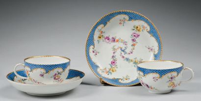 Meissen Two porcelain tea cups and saucer with polychrome decoration of garlands...