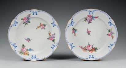 Sèvres Two soft-paste porcelain palm plates with polychrome decoration of bouquets...