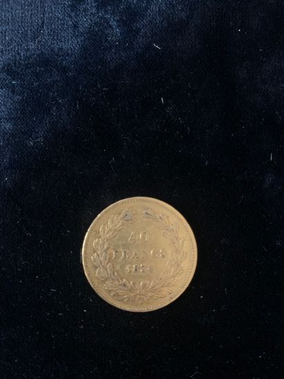 null Une pièce d'or de 40 francs Louis Philippe I (1854).
Poids: 12,83 gr.
(Usur...