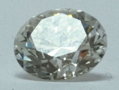null Bague en or gris 750 millièmes, ornée d'un diamant rond de taille brillant pesant...