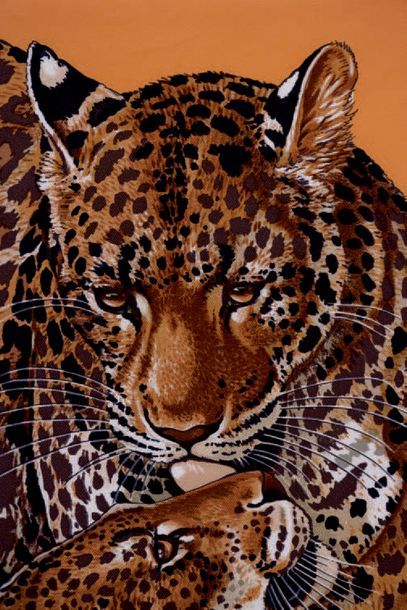 HERMES Carré «Jungle love» fond orange
90 x 90 cm avec sa boîte.