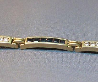 null Bracelet en or jaune serti de saphirs calibrés et diamants taille brillant en...