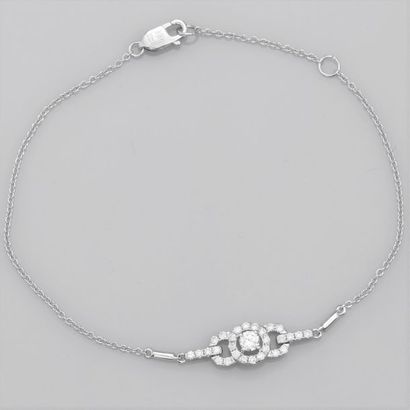   Fin bracelet en or gris 750°/00 (18K) , maille forçat, serti d'un diamant taille...