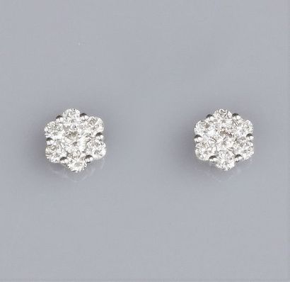   Pair of round white gold earrings, set with brilliant-cut diamonds. 1.20 g. Diameter...