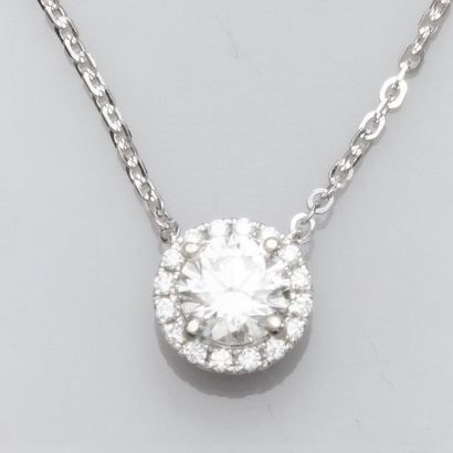   Necklace in white gold maille forçat adorned with a brilliant cut diamond of about...