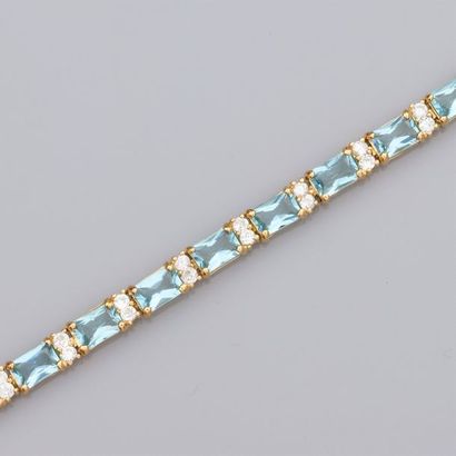   925 vermeil river bracelet, set with rectangular blue topazes with alternating...