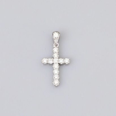 null Petite croix pendentif en or gris 750°/00 (18K), sertie de diamants taille brillant....