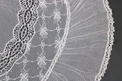null A pair of tulle and lace blinds from Le Puy, H: 3m X 1m60, a large oval linen...
