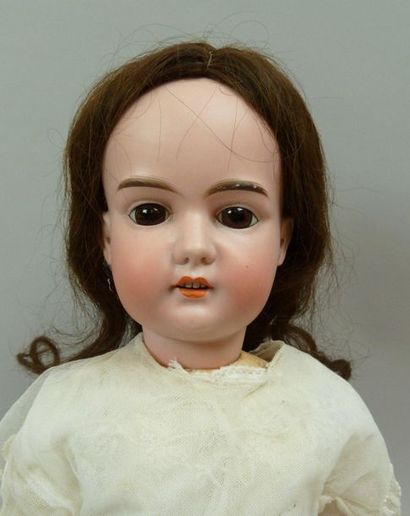 null German doll, porcelain head marked in hollow: A13M, brown fixed eyes, mouth...