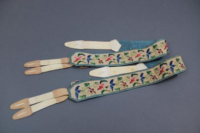 null Pair of straps, 19th century, cross stitch embroidery, leather trim, in their...
