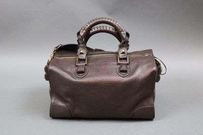 null BALENCIAGA

Brown leather bag in lizard style with its shoulder strap and m...