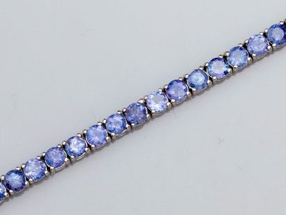 null Bracelet rivière en argent 925, serti de tanzanites rondes. 11.7 g. L: 18.5/21...