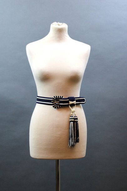 null Two belts

Yves SAINT LAURENT Rive Gauche : in navy and white trimmings with...