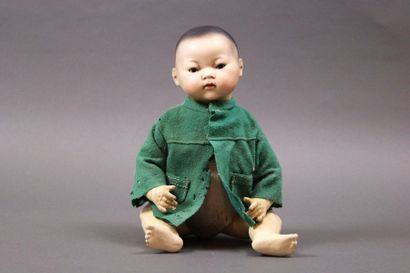 null Small Asian doll, full porcelain head marked in hollow: AM 353/3K, brown moving...